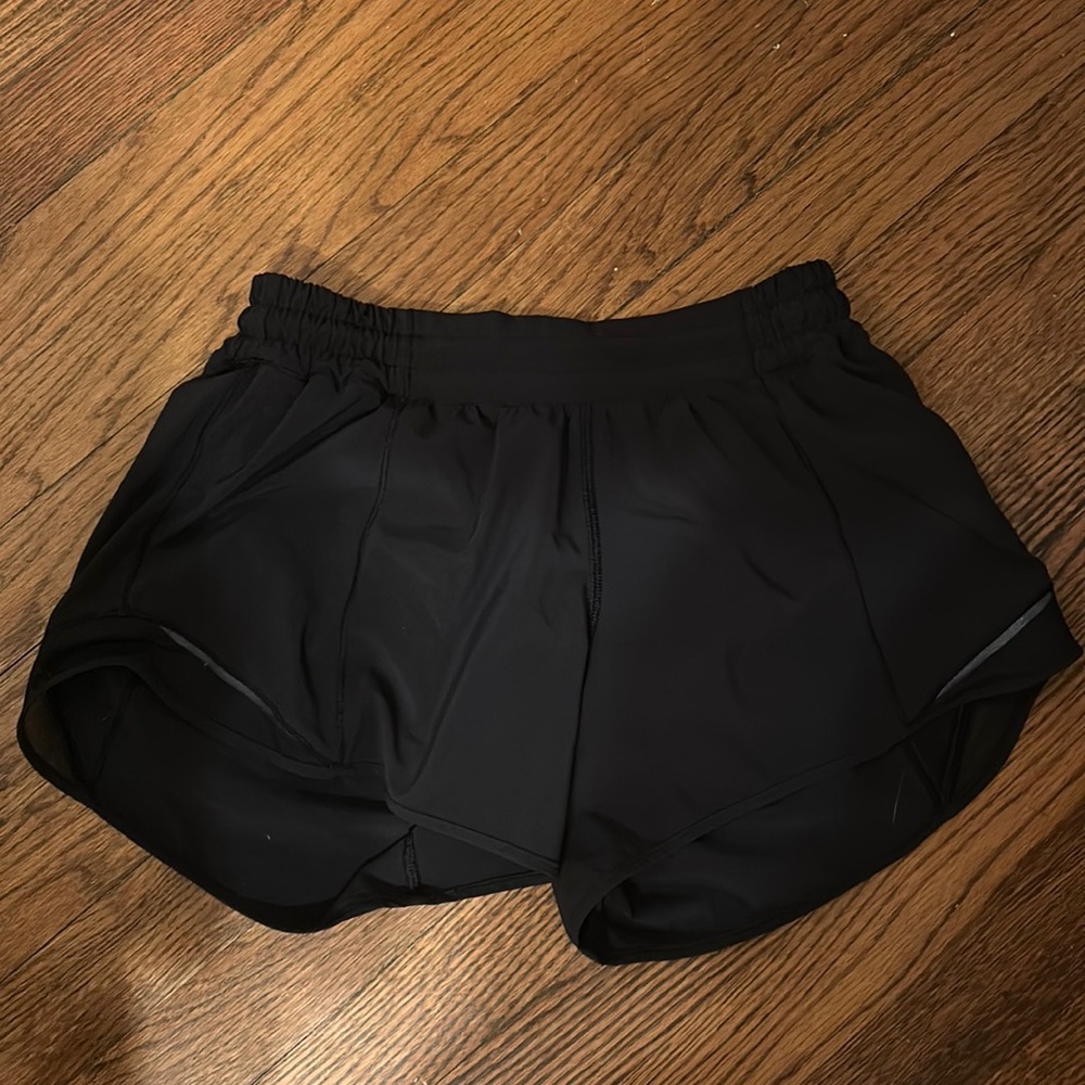 Black lululemon low-rise hotty hot shorts, 4 inch inseam